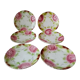Series of 6 plates in slip decorated with roses