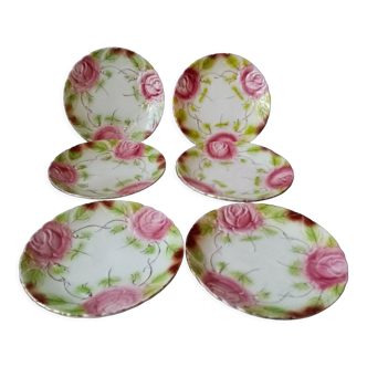 Series of 6 plates in slip decorated with roses