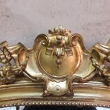 Golden mirror with pediment XIXth