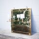 mirror with articulated wall light