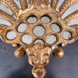 Palm-shaped faceted mirror