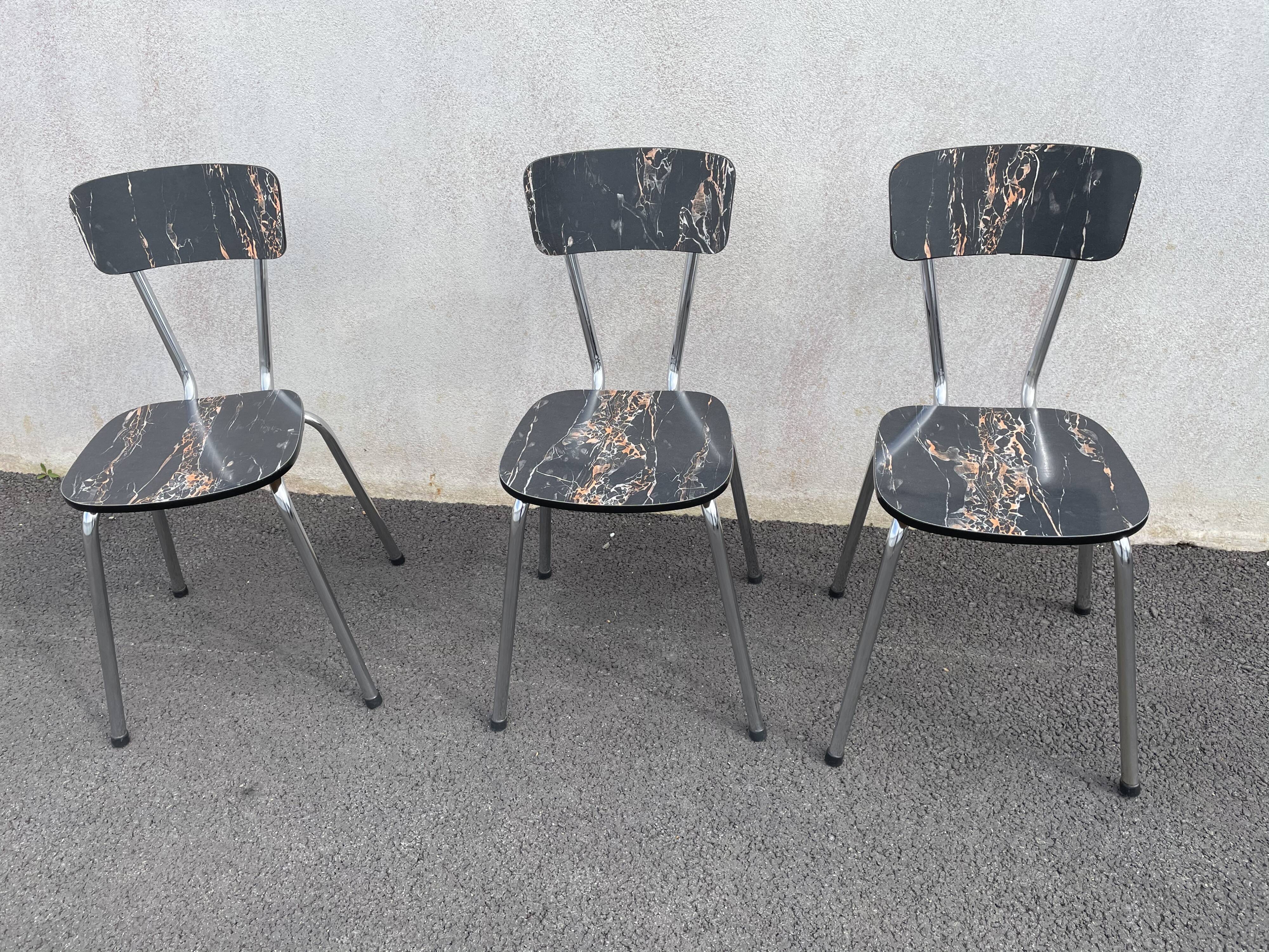 Black marbled formica chairs