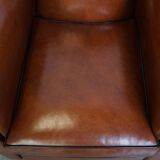 Set of 2 sheepskin design armchairs in the moustache model, in very nice condition
