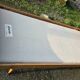 Read a vintage wooden and cane bed, with compass legs – mattress 80 × 190 cm.