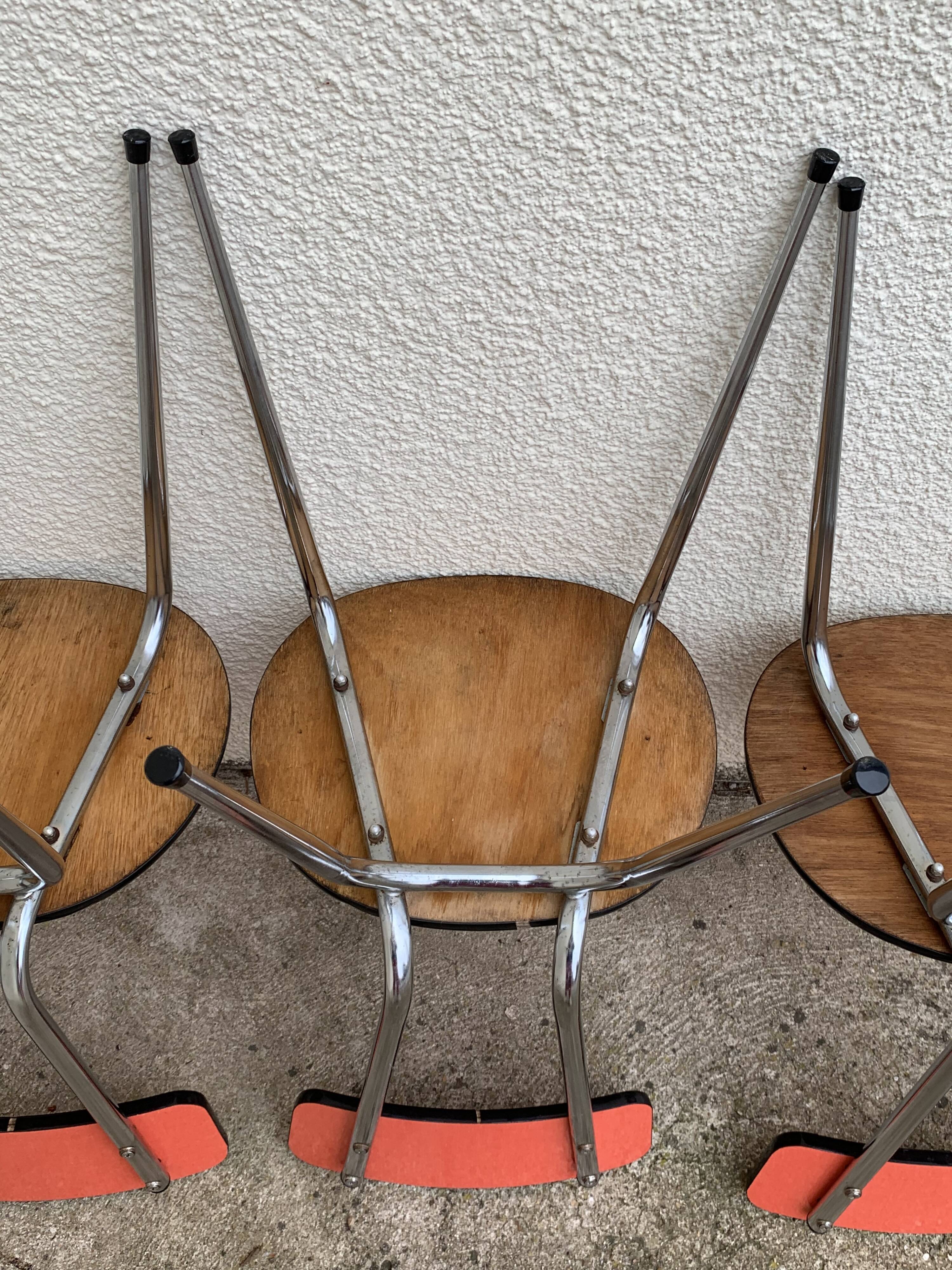 Red formica chairs 1950