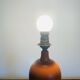 Orange turned wooden lamp base
