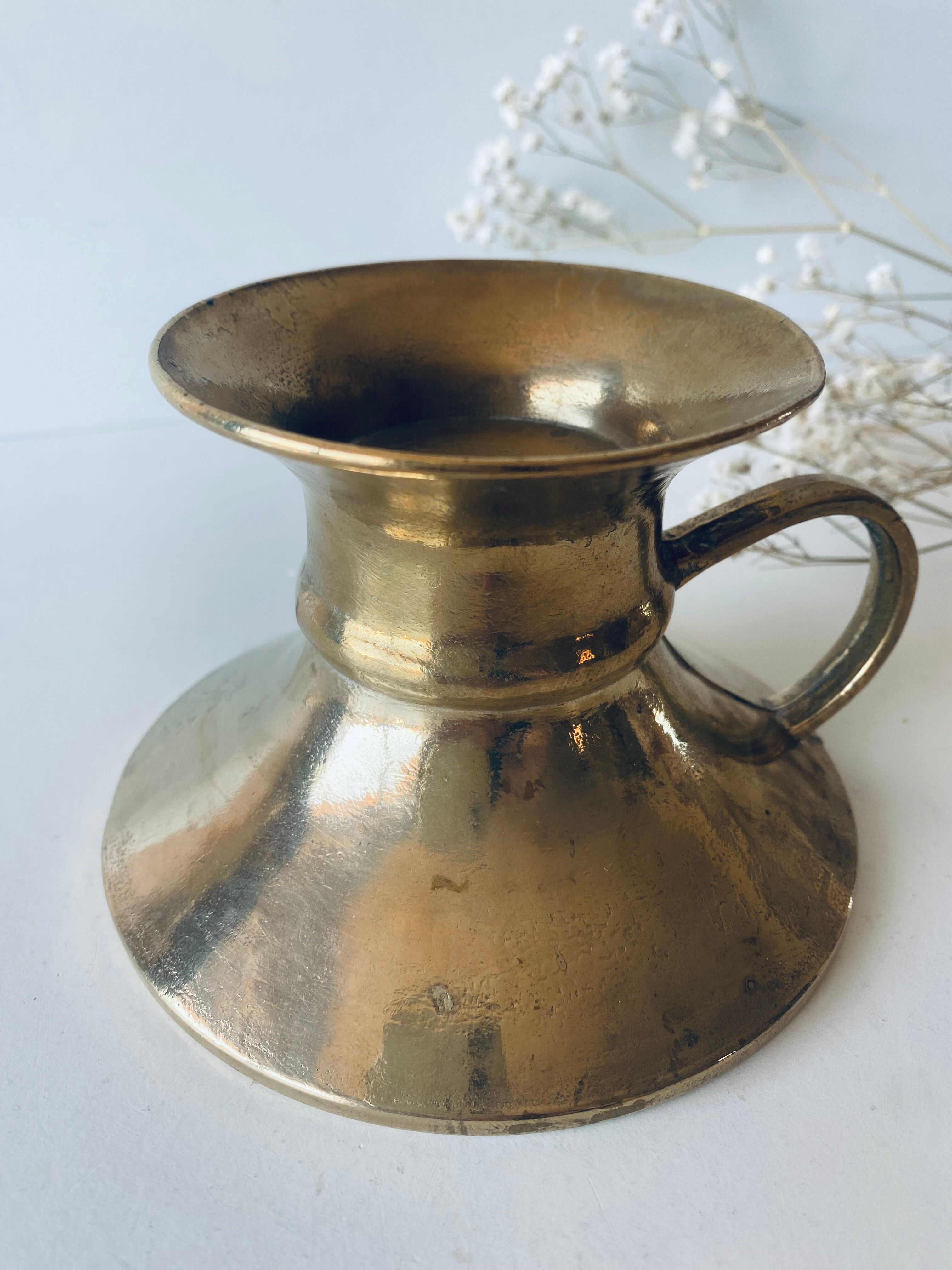 Old bronze church candle holder