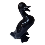 Duck statuette in black ceramic.