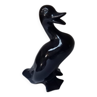 Duck statuette in black ceramic.