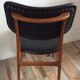 Scandinavian chair of the 60s in teak and black skaï