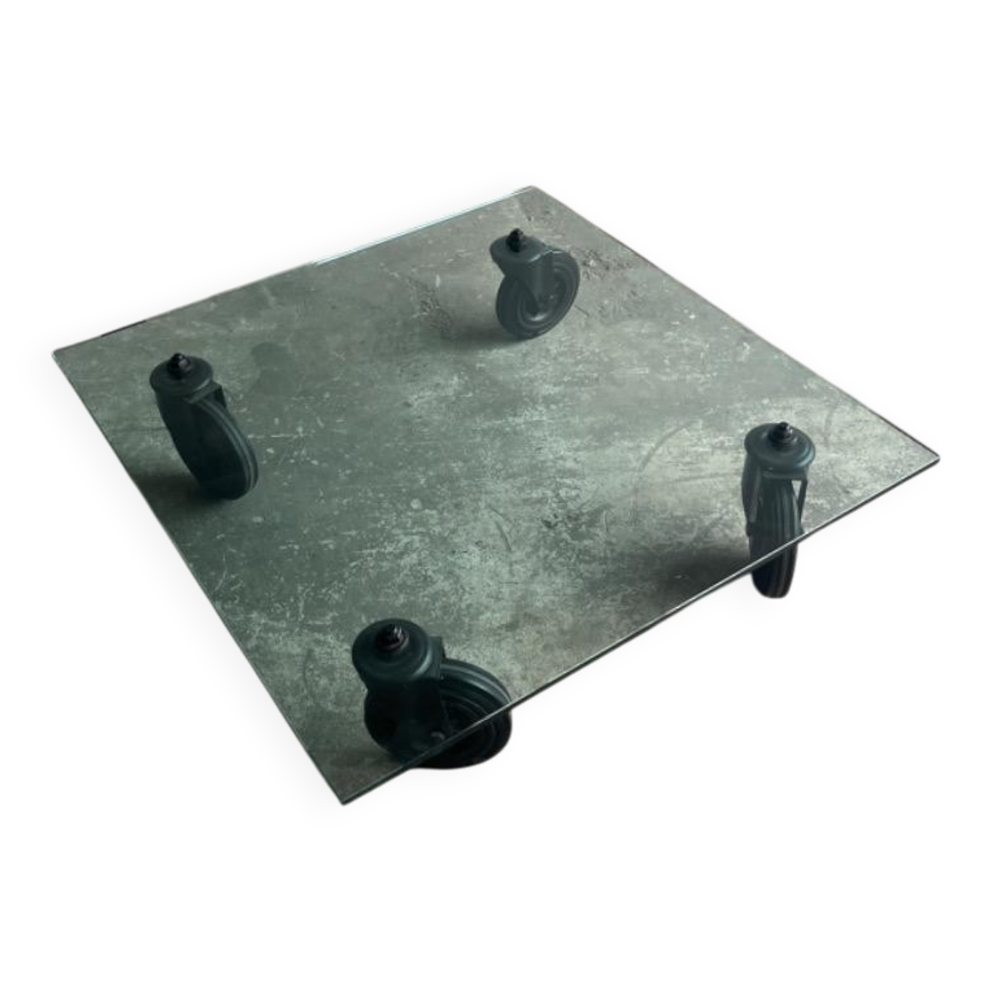 Gae Aulenti coffee table for Fontana Arte, transparent glass top with black cast iron supports, 1980s.