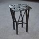 Wrought iron and woven metal stool, France, 1950s