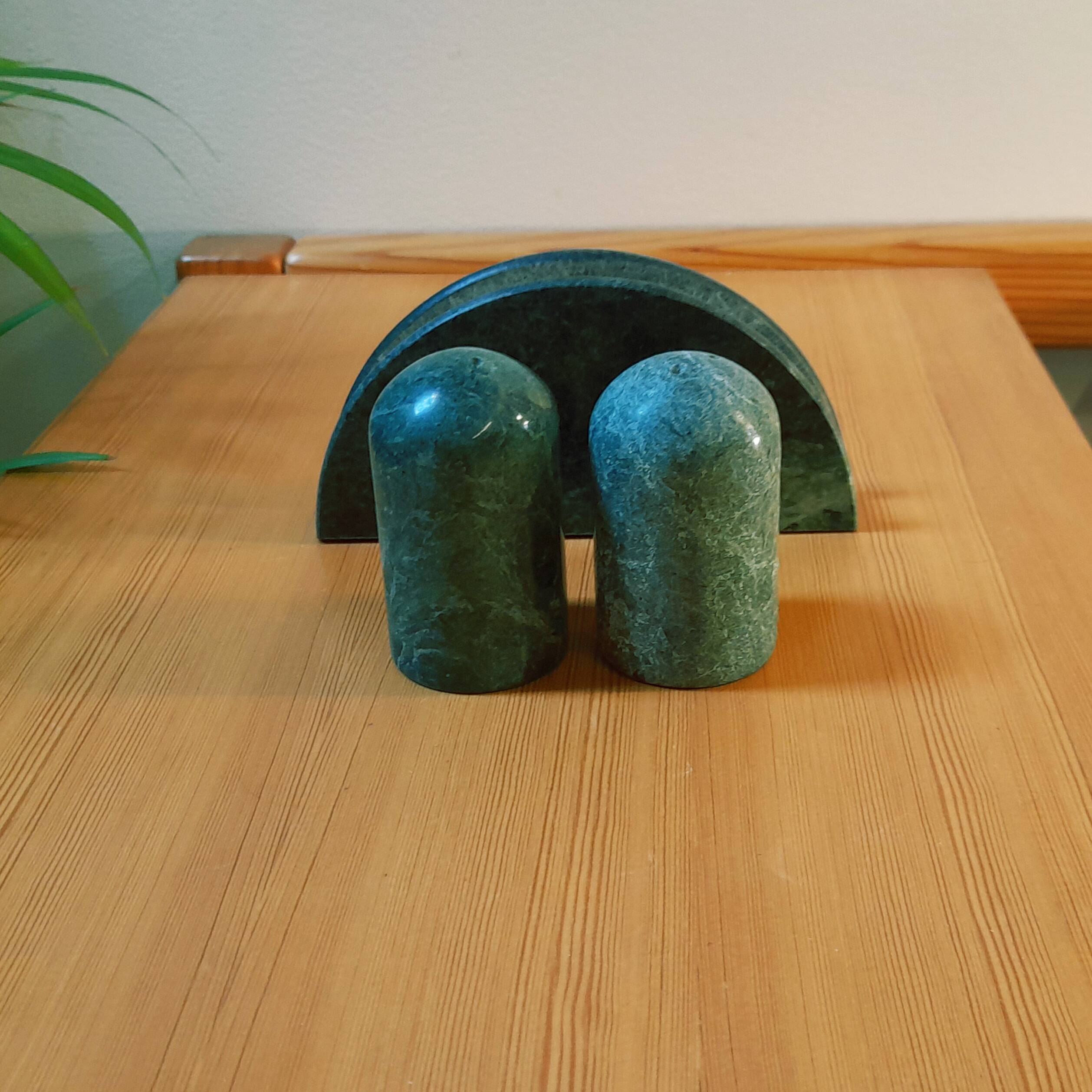Trio of salt shakers, pepper shakers and napkin holders in green marble