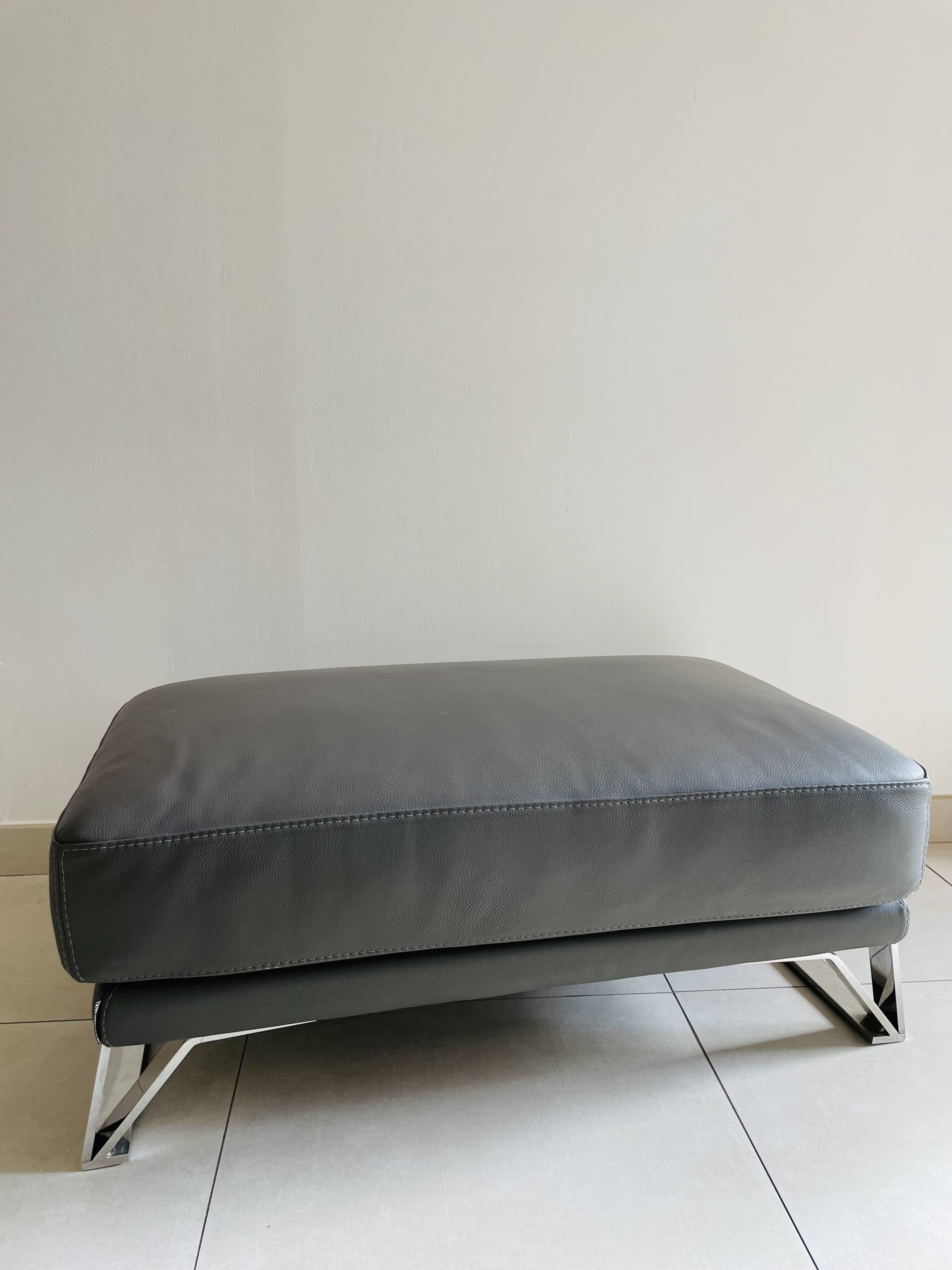 Large Roche Bobois leather pouf in gray color