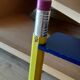 wooden wall shelf multicolor pencils Pierre Sala