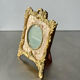 Metal gold colored picture frame brass