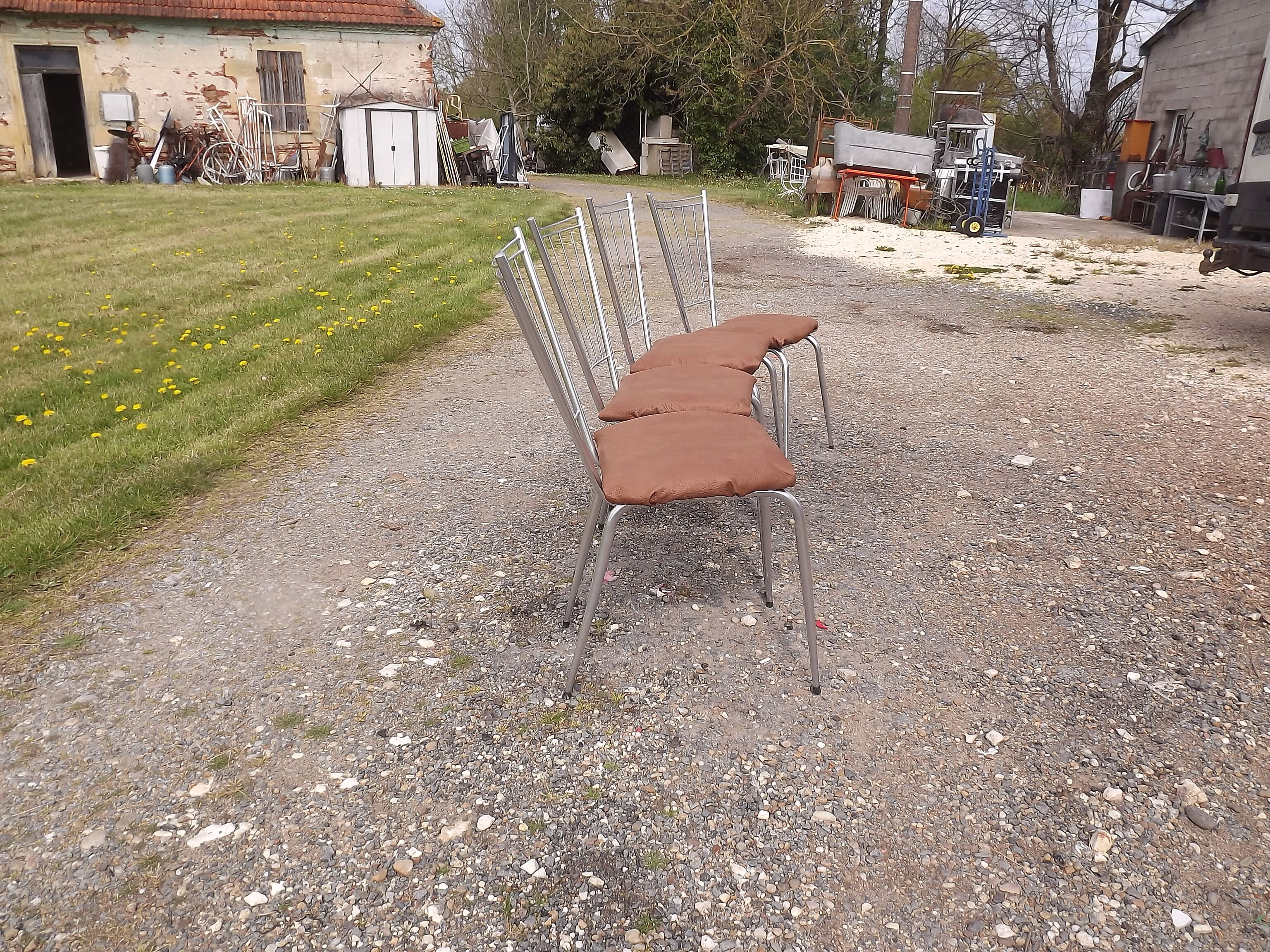 4 vintage chrome and skai chairs