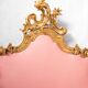 Italian rococo-style headboard in carved gilded wood, 19th century.