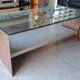 Metal coffee table with a glass top.