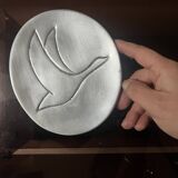 polished aluminum pocket emptier, signed and stamped in the mass