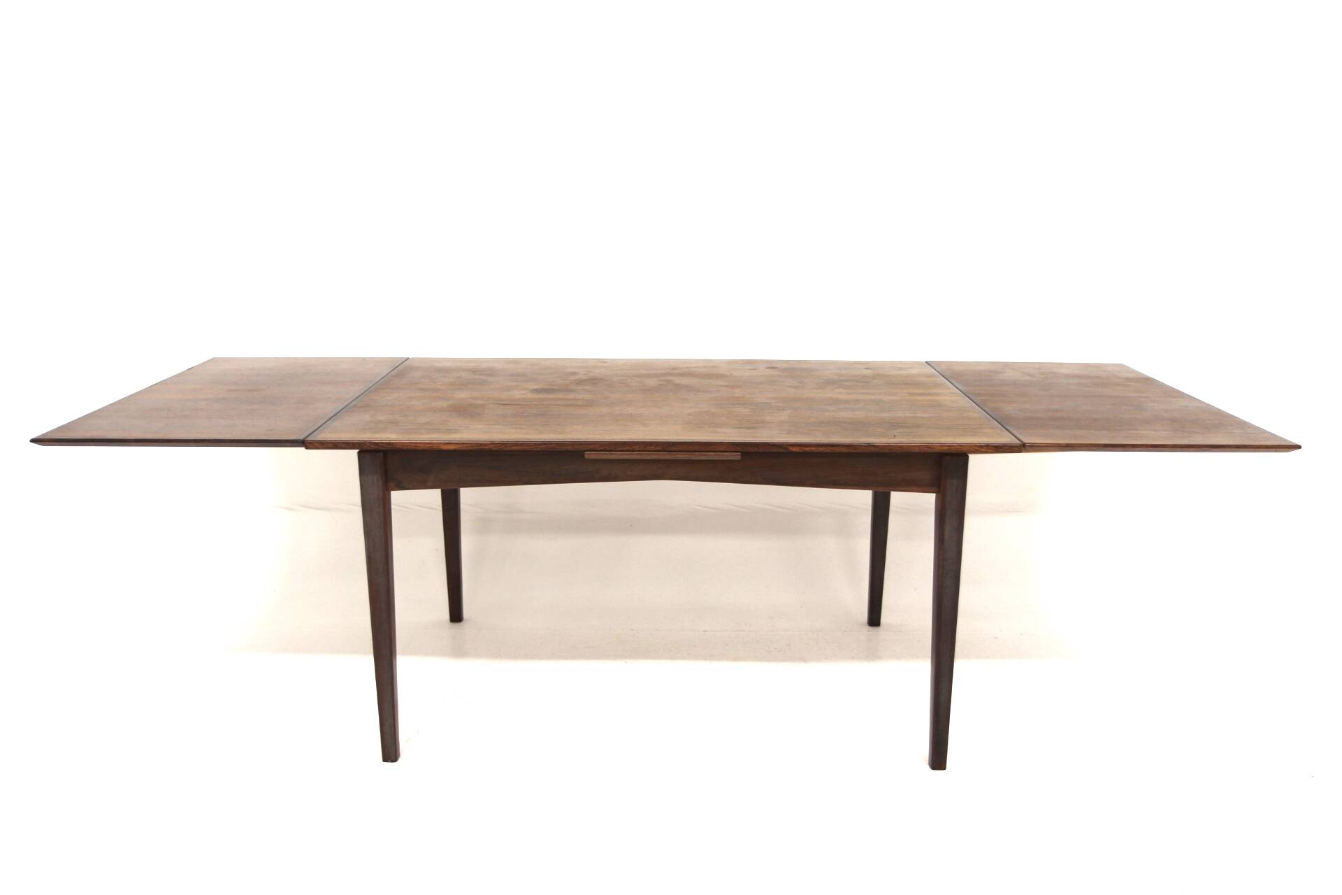 Rosewood “portfolio” dining room table, Sweden, 1960s