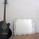 Old chiseled mirror