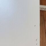 Dresser repainted in off-white and grey-pink colours.