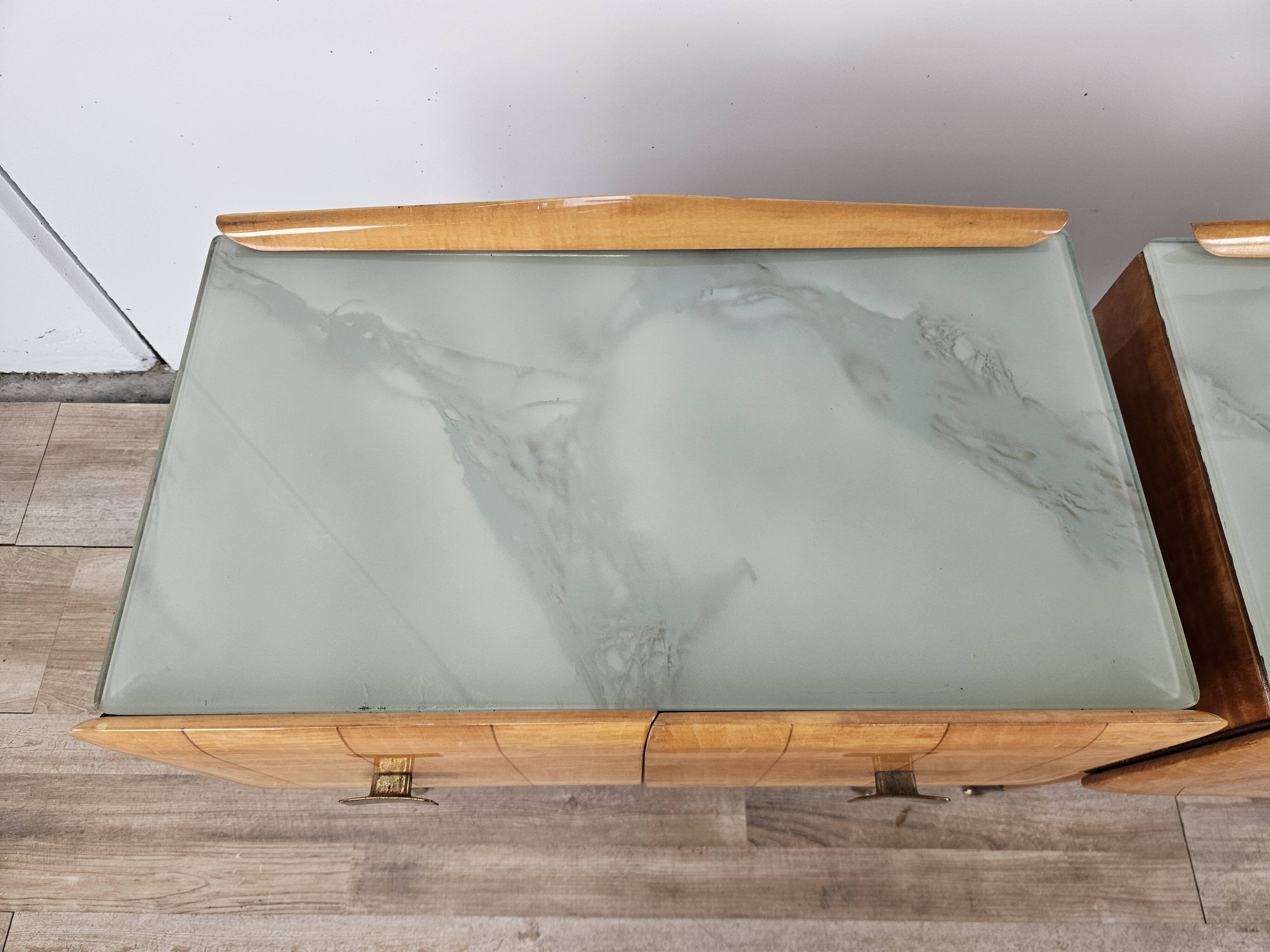 Mid-century nightstands in maple, brass, and glass