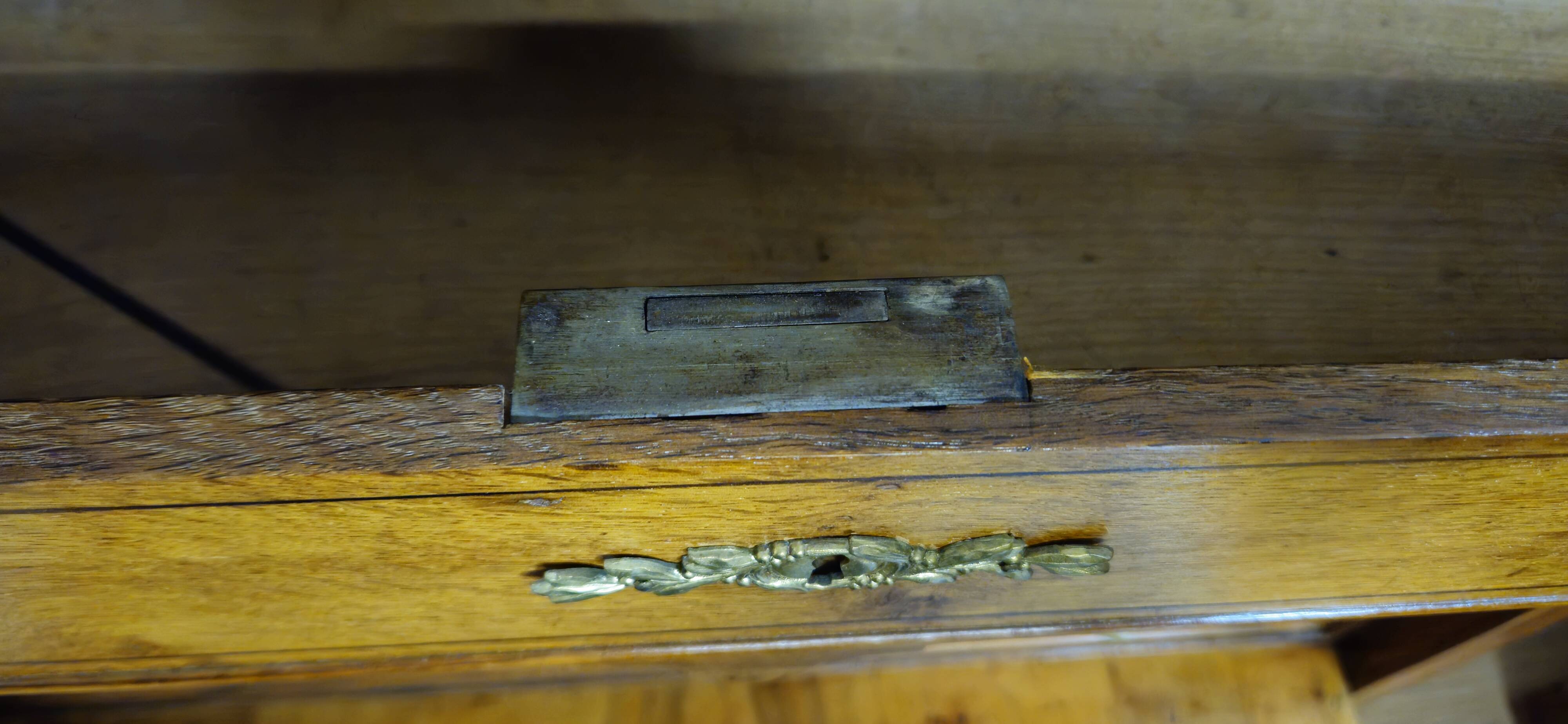 Secretary with a curved drop-leaf in floral marquetry, mid-19th century.
