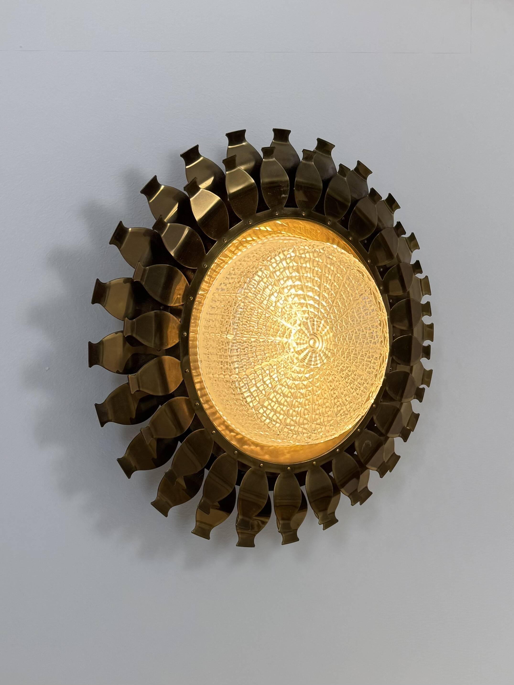 Vintage brass and pressed glass wall light, Sweden, 1960.