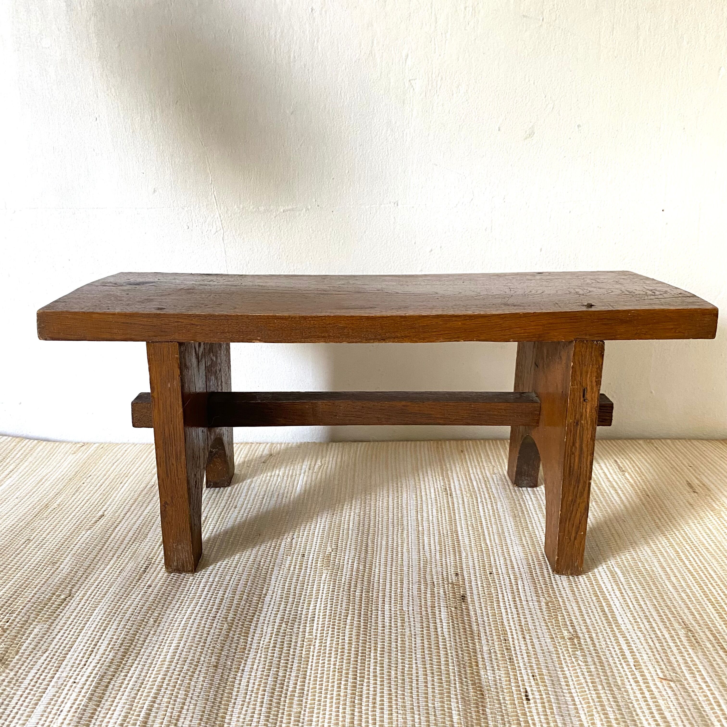 Low stool or wooden plant holder