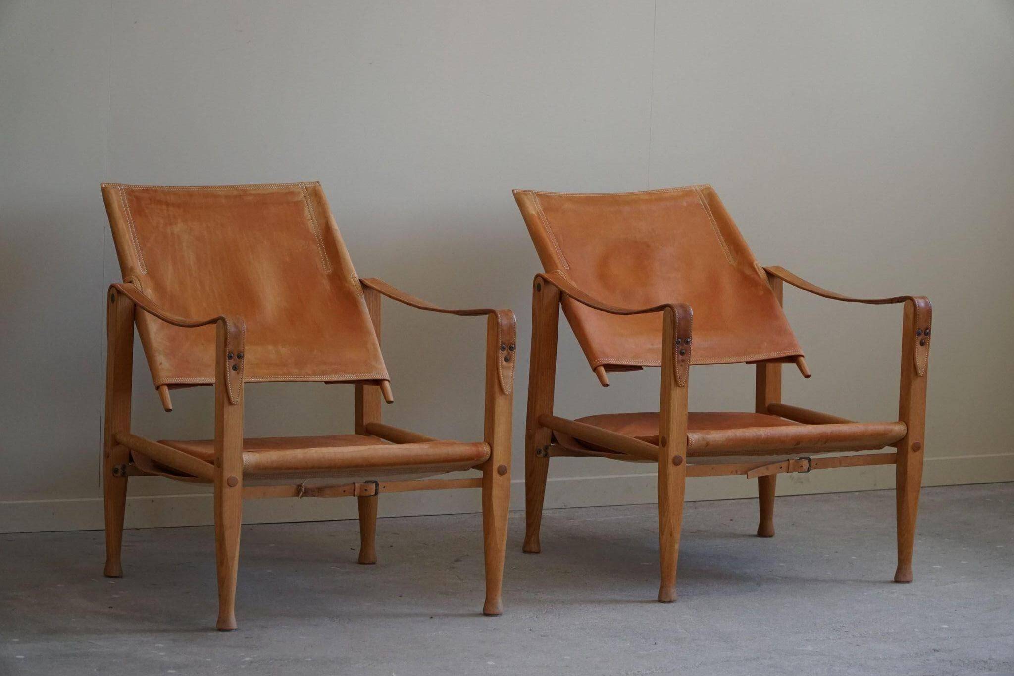 Kaare Klint, a pair of Safari chairs in ash and leather, Rud. Rasmussen, 1960s.