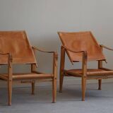 Kaare Klint, a pair of Safari chairs in ash and leather, Rud. Rasmussen, 1960s.