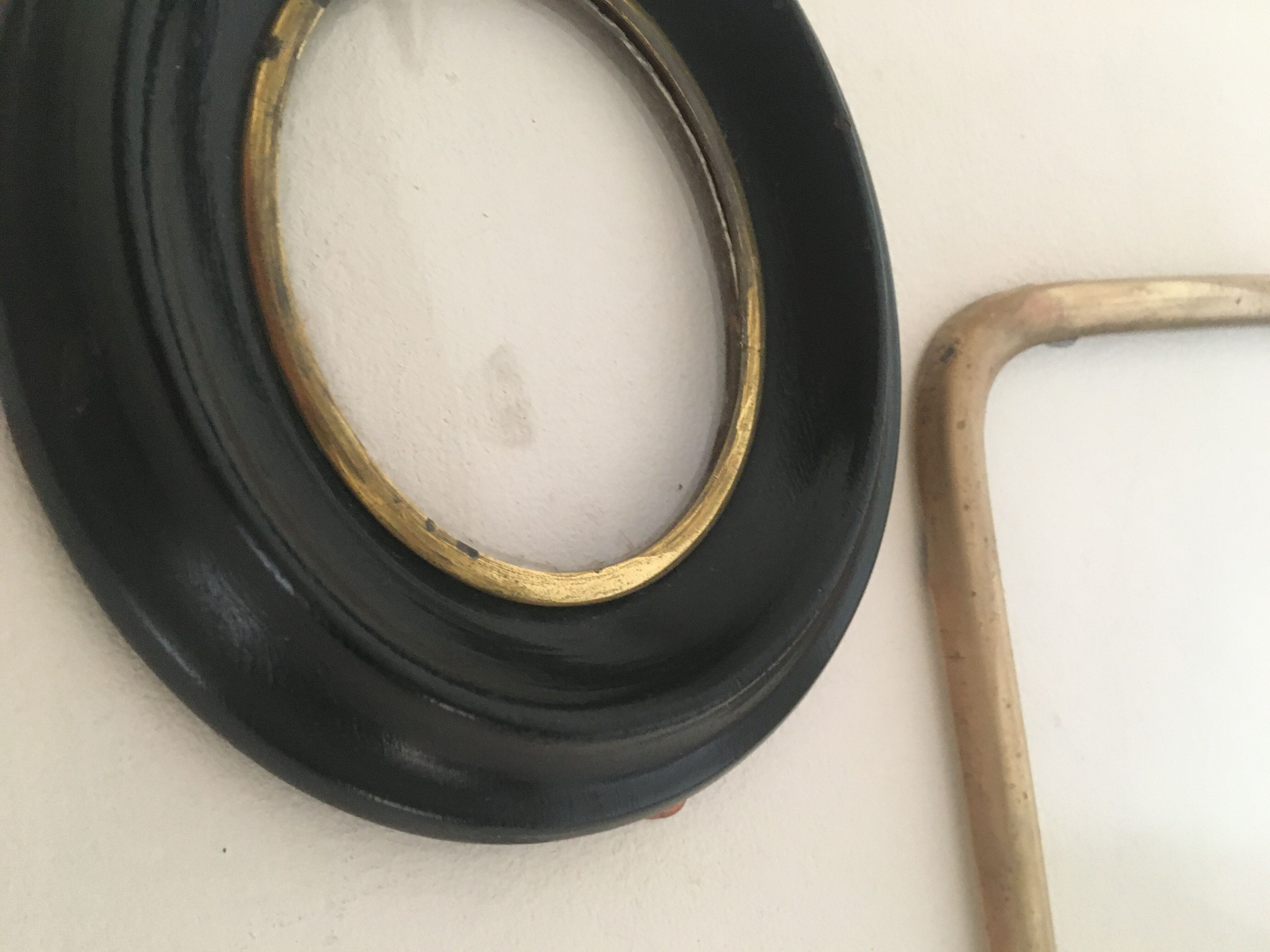 Set of wooden and brass frames with windows