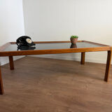 Large Scandinavian coffee table in teak and smoked glass.