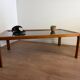 Large Scandinavian coffee table in teak and smoked glass.