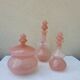 Old bottles in powder pink opaline