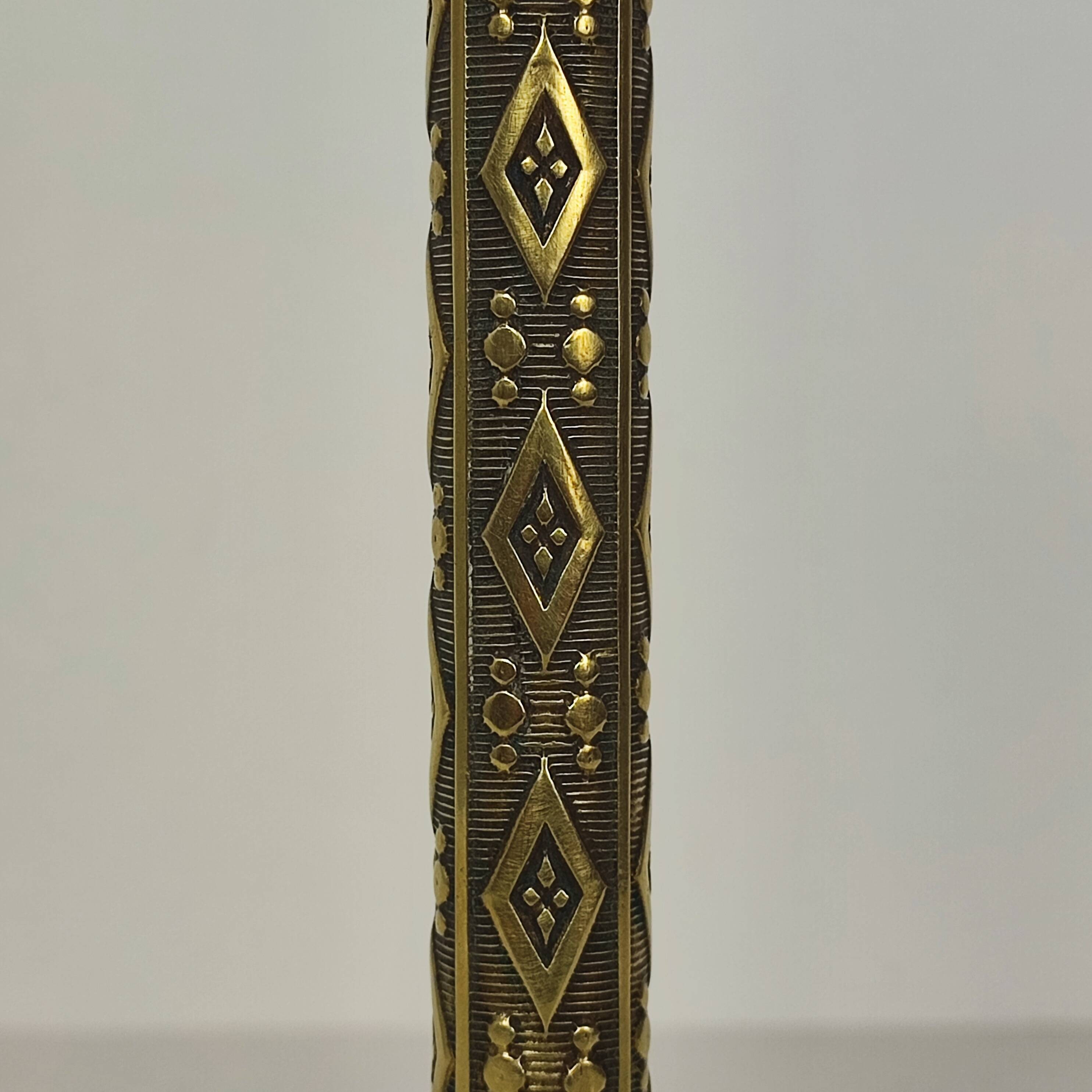 Gilt bronze candle holder