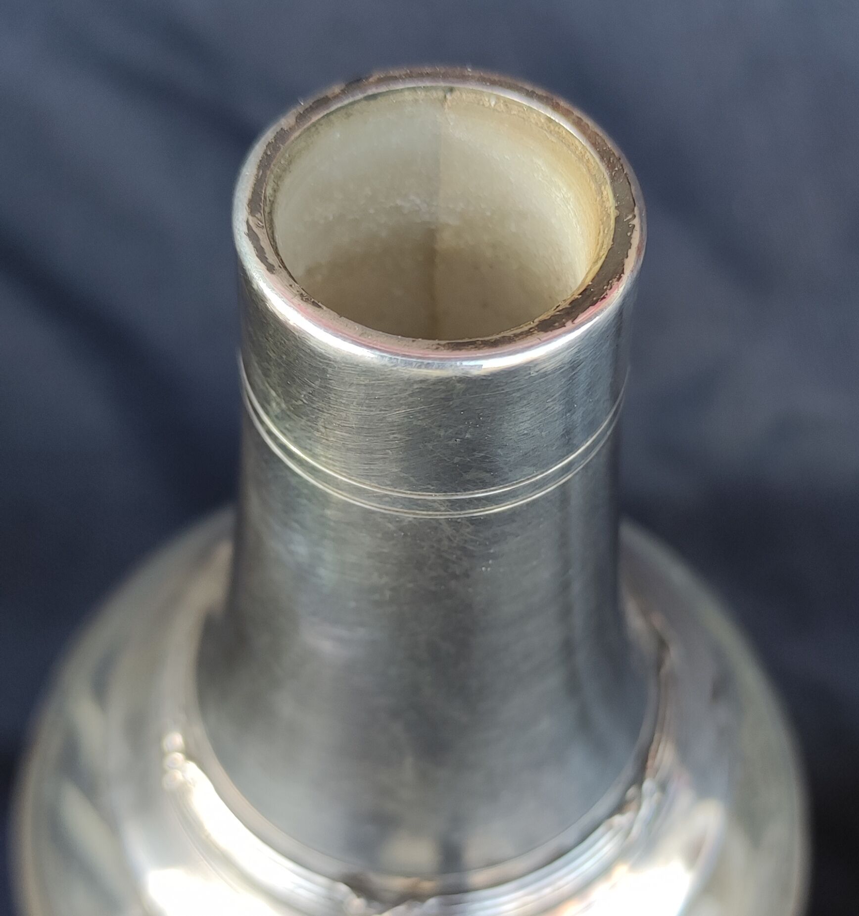 Old silver metal carafon