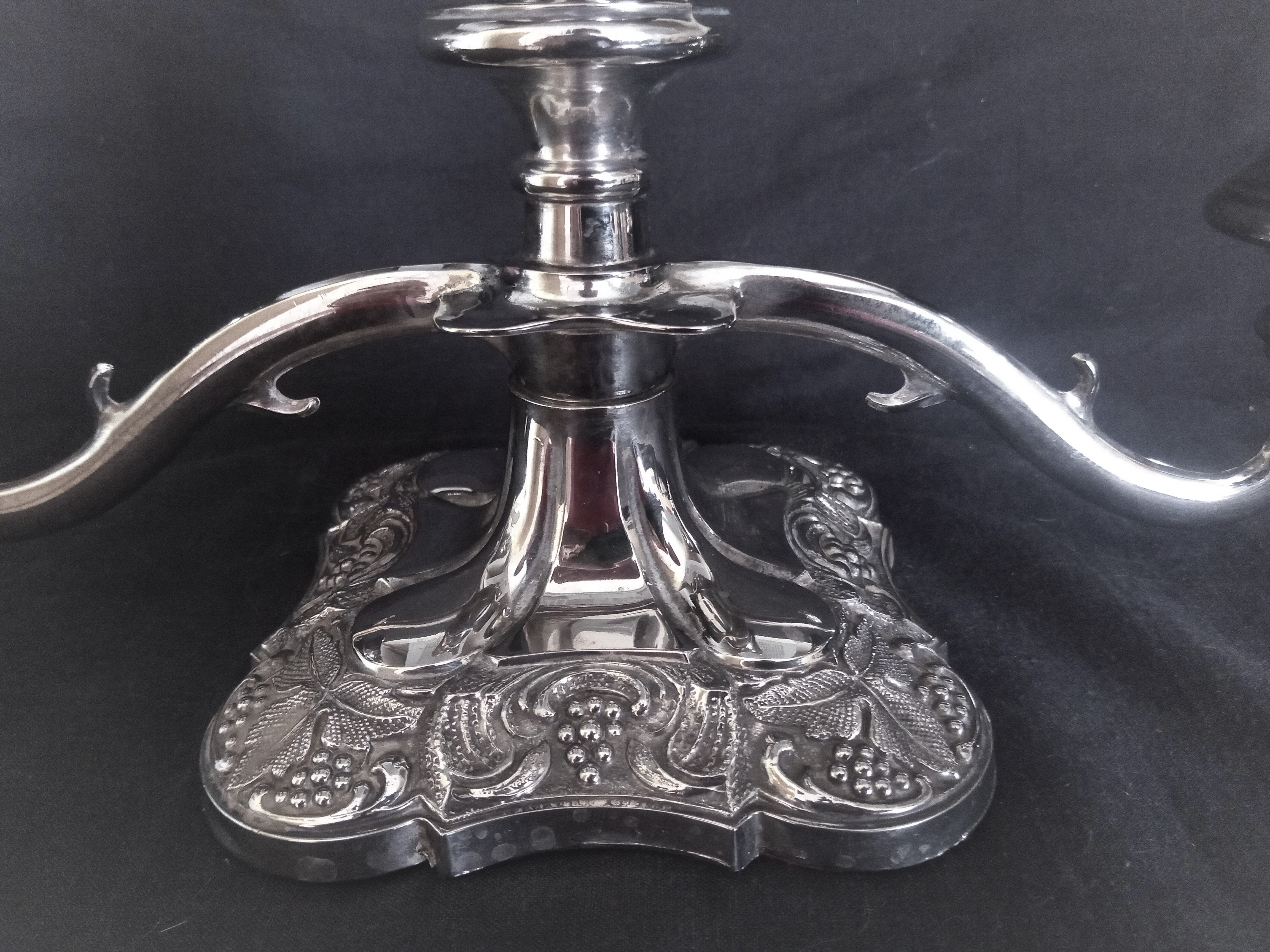 Candlestick in silver metal
