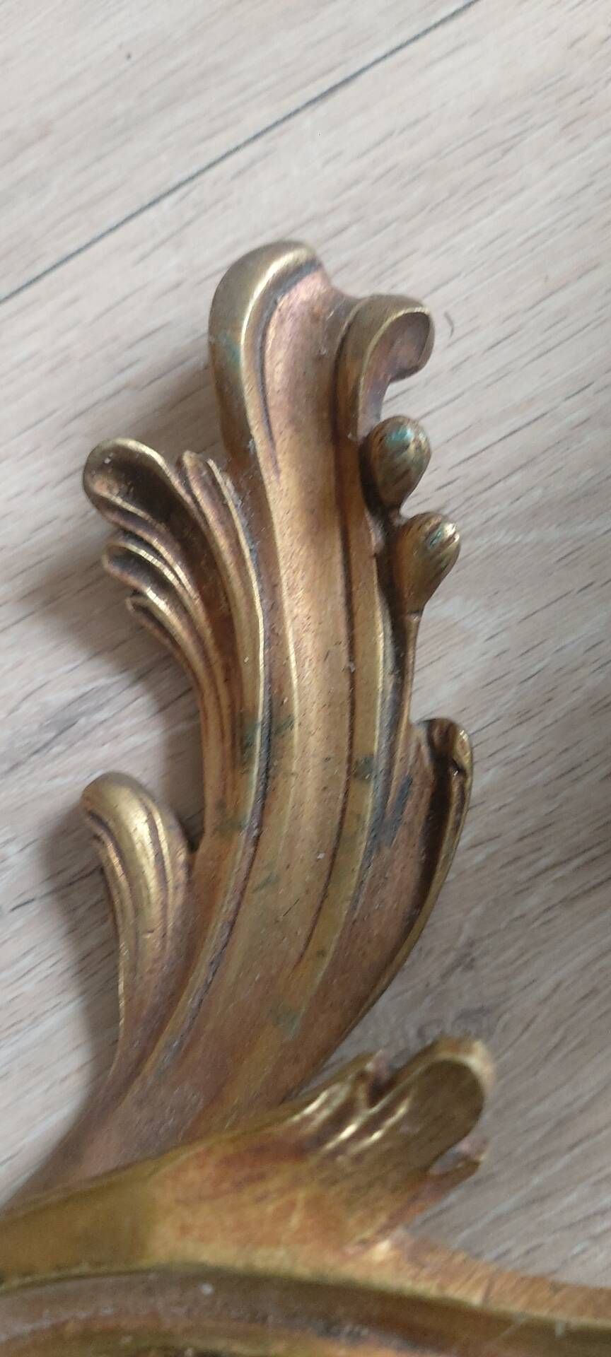 Pair of original antique bronze wall sconces.