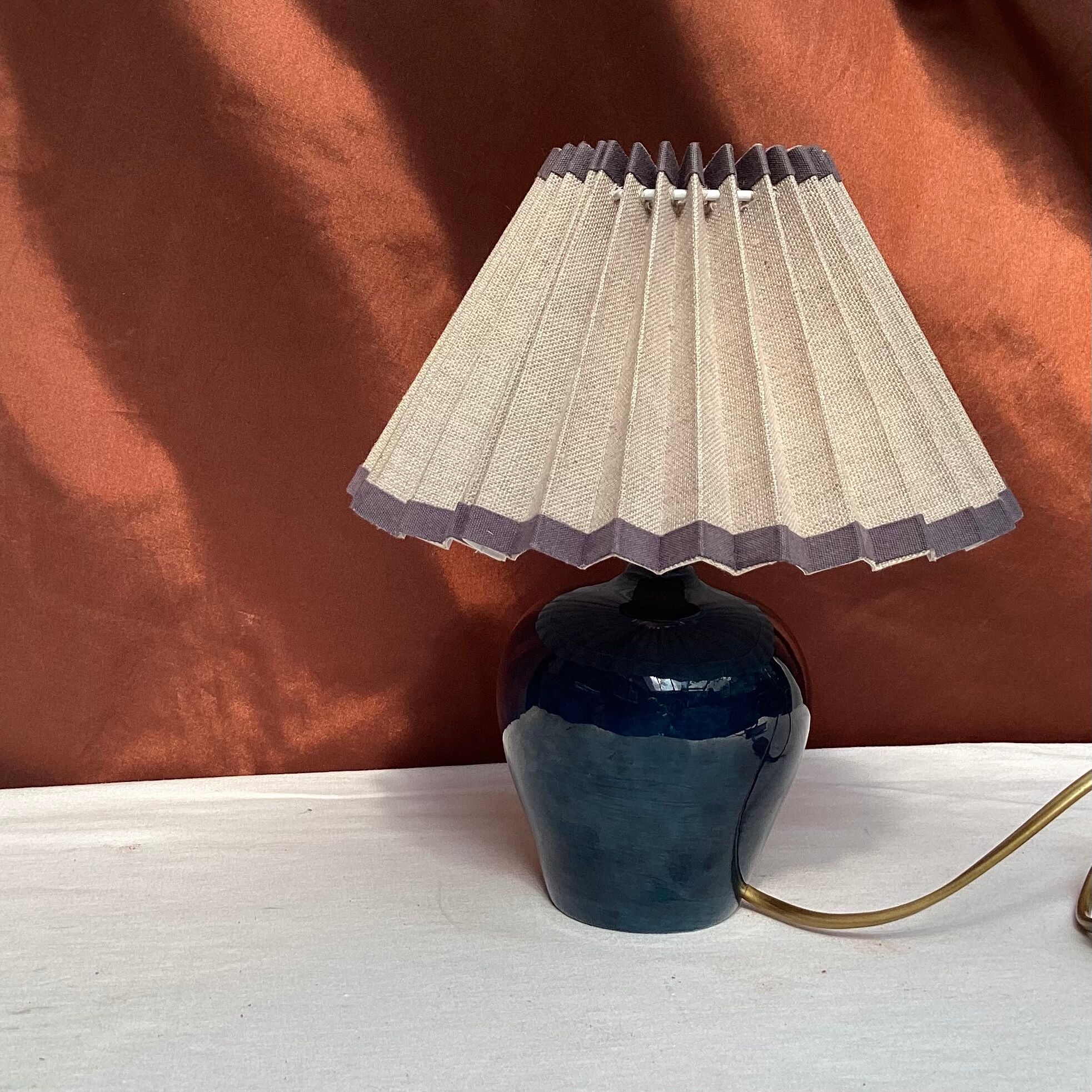 Ceramic lamp signed with pleated lampshade
