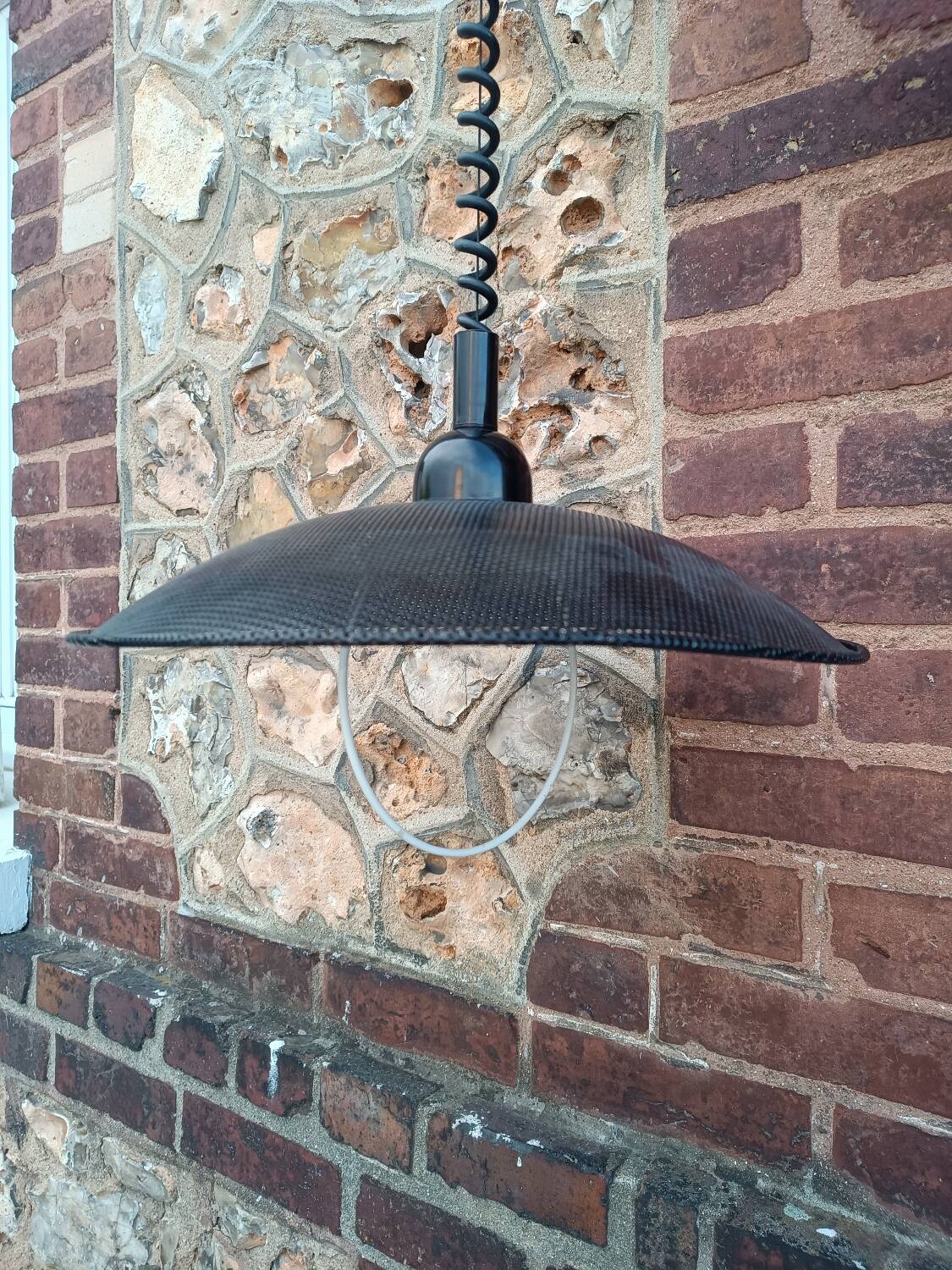 Scandinavian pendant light in perforated sheet metal