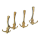 4 golden brass coat racks