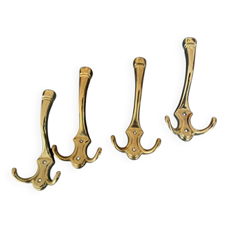 4 golden brass coat racks