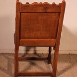 high-backed armchair from the 17th century in oak