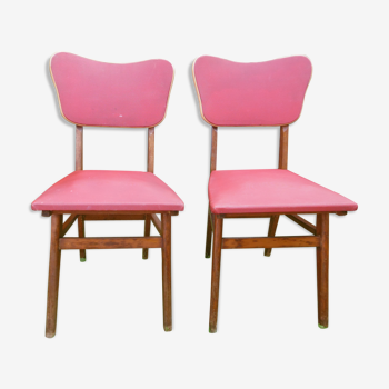 Two vintage red chairs