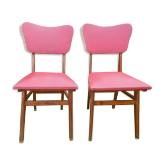 Two vintage red chairs