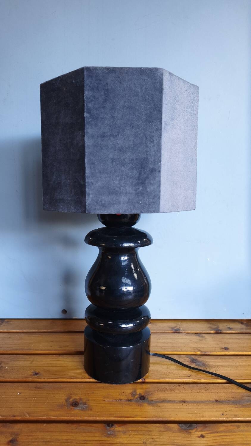 Sculptural table lamp made of turned wood