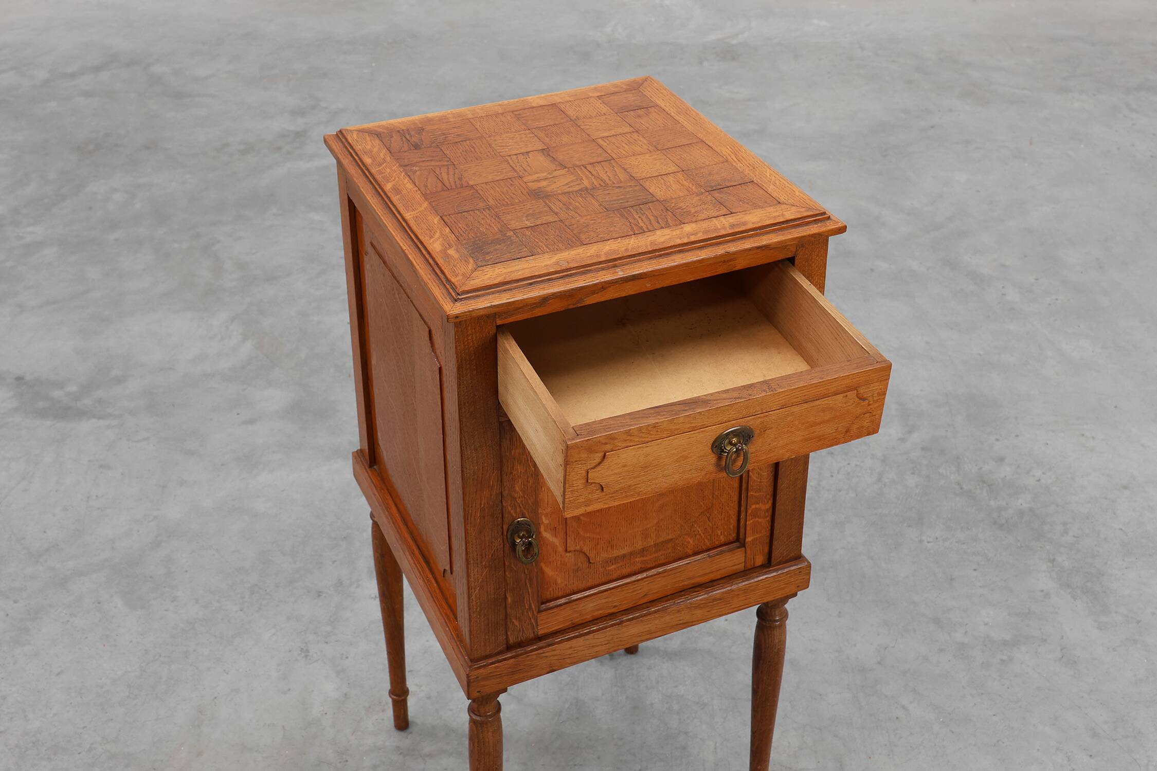 Art Deco nightstand in oak with turned legs, France 1920